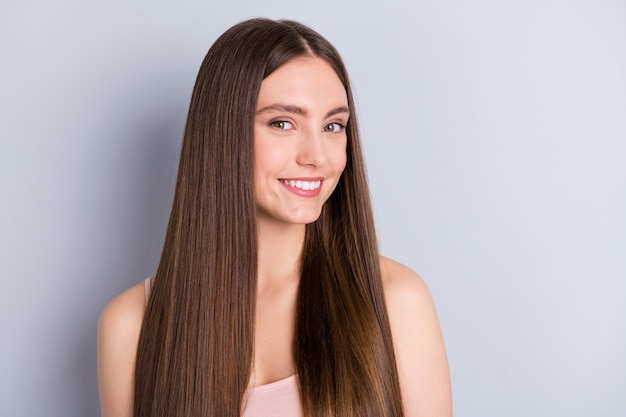 girl with healthy hair isolated on grey