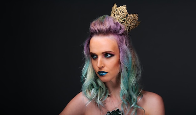 Girl with multicolored hair and crown on her head