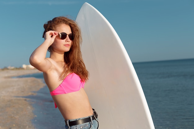 Girl with surfboard