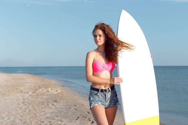 Girl with surfboard