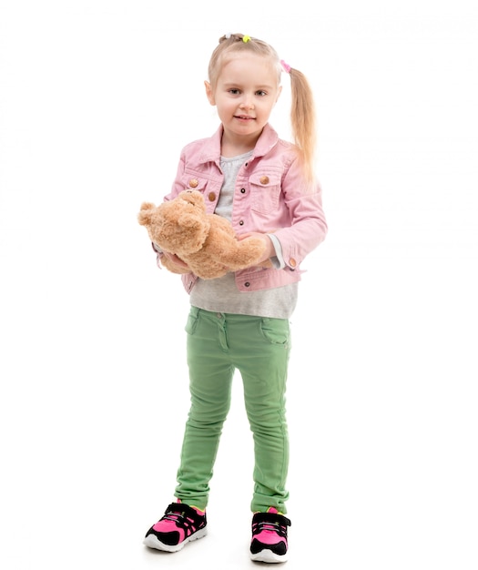 Photo girl with toy, isolated on white background