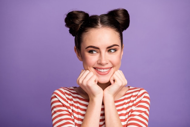 girl with trendy hairstyle isolated on purple