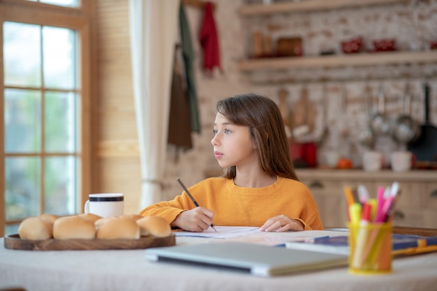 Girl working on her lessons