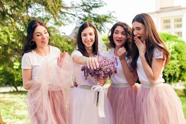 The girlfriends share happiness with the bride