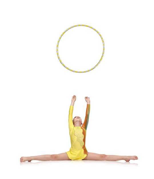 Photo girlgymnastthrows up hula hoop