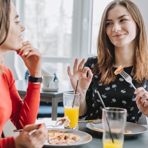 Girls eating in a restaurant