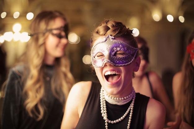 Girls having fun in a disguise party