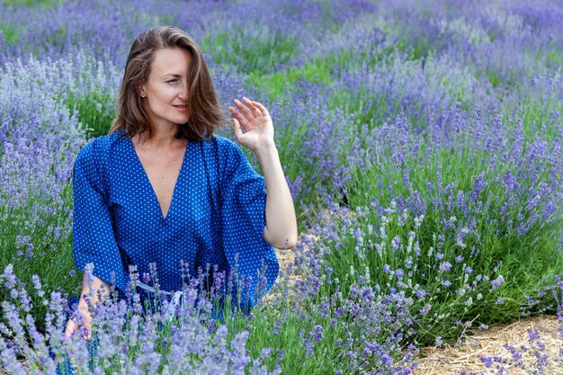 Girls in lavender flowers on the field