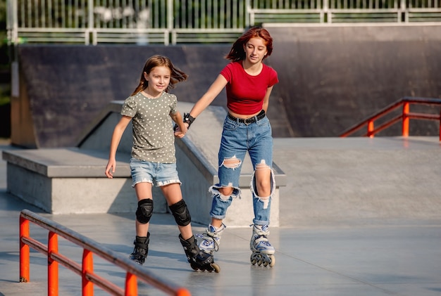 Girls with roller skates outdoors