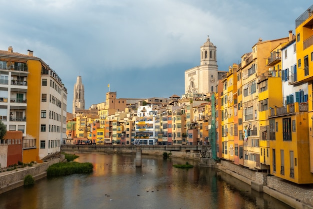 Girona medieval city, panoramic from the famous red bridge Pont de les Peixateries Velles, Costa Brava of Catalonia