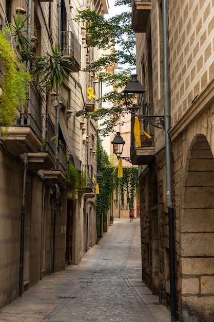 Girona medieval city, yellow elements and ties in solidarity with the political conflict, Catalonia's Costa Brava in the Mediterranean. Spain