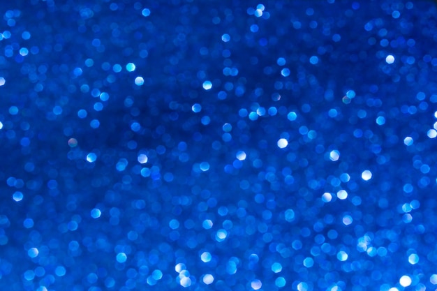 Glamor blue sparkling background Blured glitter background Holiday abstract texture