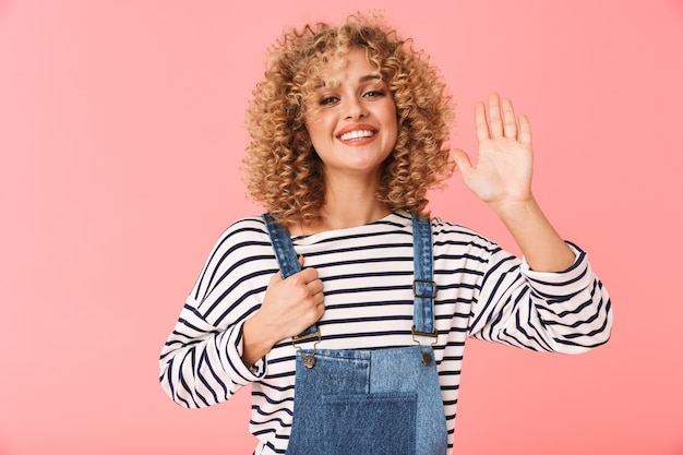 glamorous curly woman 20s smiling