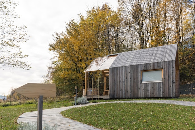 Photo glamping park with unique wooden cabins hot tubs on terraces panoramic overlooking the surrounding