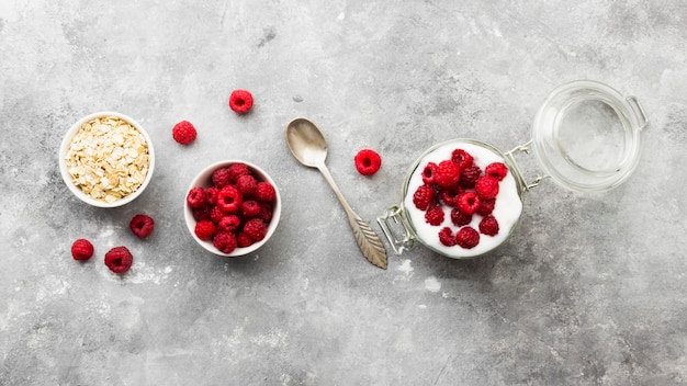 Glanola in glass jar with raspberry