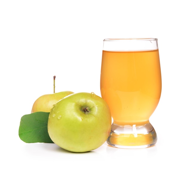 Glass of apple juice and apples isolated on white