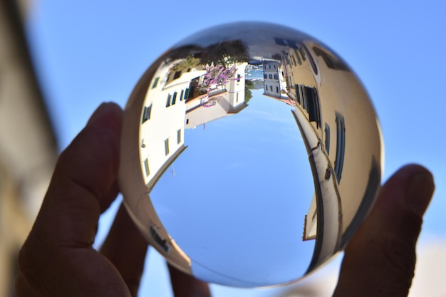 A glass ball with a blue sky in the background