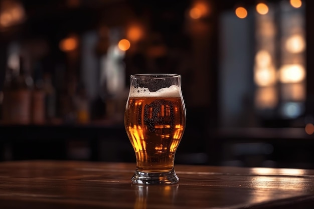 Glass of beer on a table in a bar on blurred bokeh background