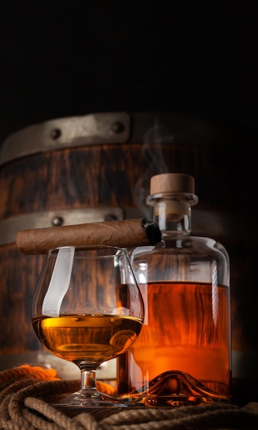 Photo glass and bottle with cognac