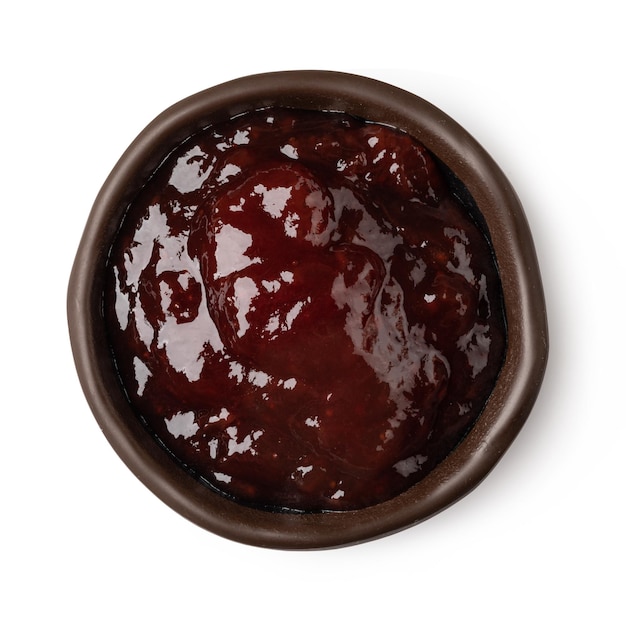 Glass bowl of red berry jam