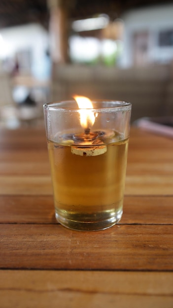 Glass candle light at the dinner table romantic or aromatic