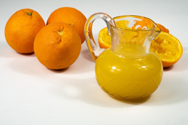 glass carafe with freshly squeezed orange juice