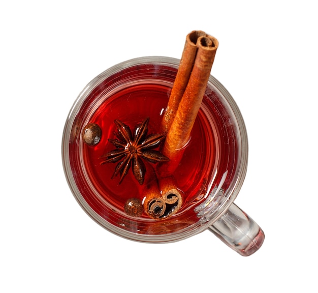 Glass of Christmas mulled wine with cinnamon star anise and cloves