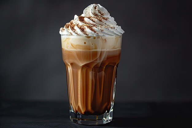 Photo glass of coffee drink with whipped milk dark background