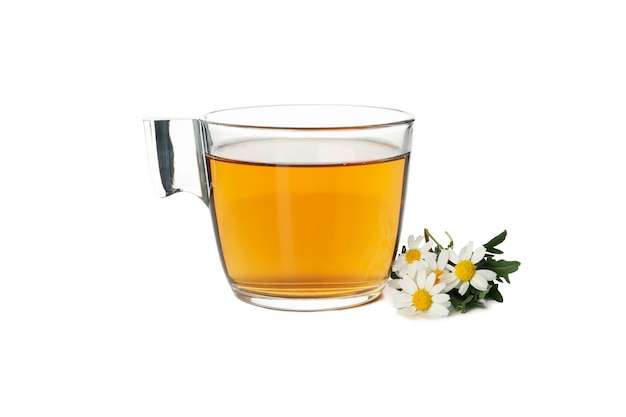 Glass cup of chamomile tea isolated on white background