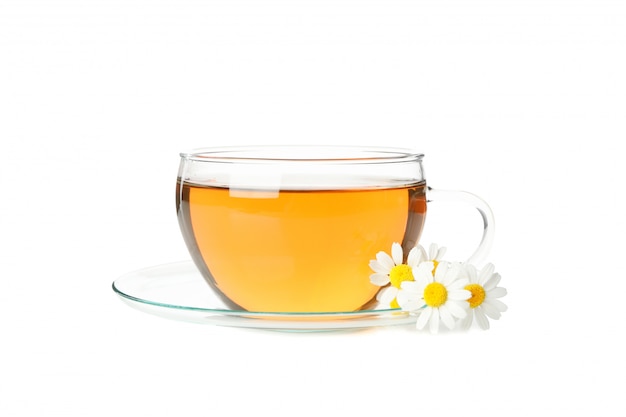 Glass cup of chamomile tea isolated on white