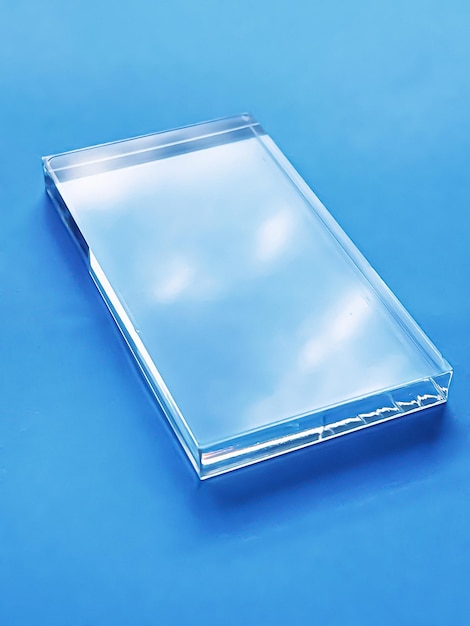 Glass device on blue background future technology and abstract screen mockup design