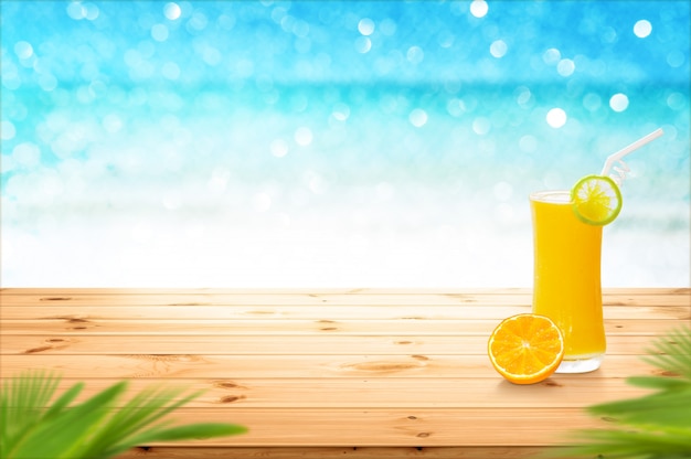 Glass of fresh orange juice on a wooden table