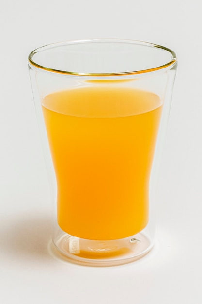 A glass of fresh organic orange juice