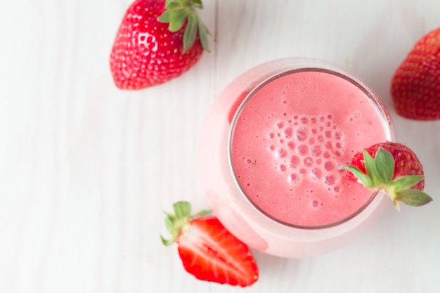 A glass of fresh strawberry smoothie 