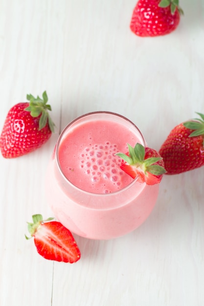 A glass of fresh strawberry smoothie