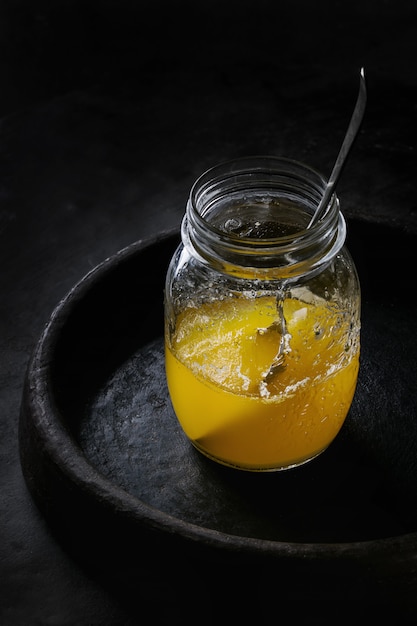 Glass of ghee butter