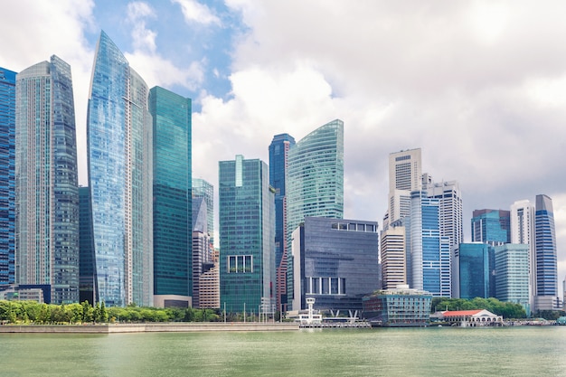 Glass high skyscrapers in the center of Singapore on the waterfront.