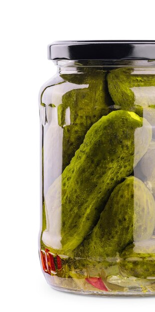 A glass jar of tasties canned cucumbers on white background