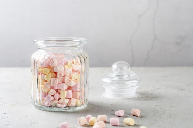 Glass jar with colored marshmallow