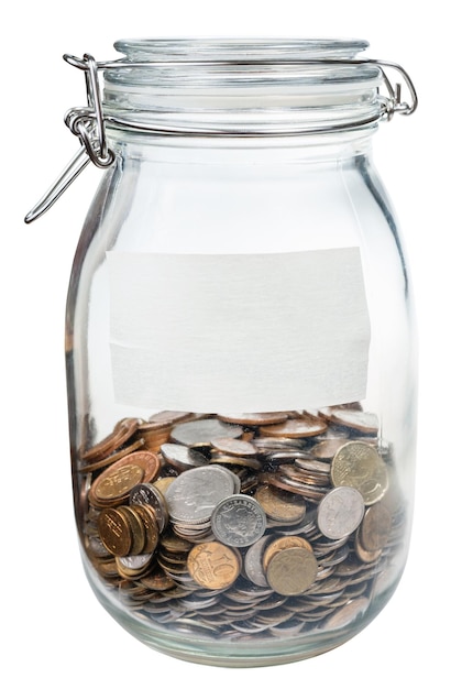 Glass jar with empty label and saved money