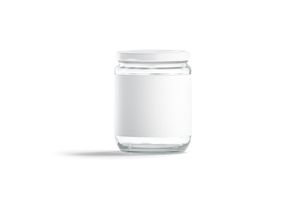 Glass jar with white label and cap Storage canister with sticker Glas utensil for jam or juice