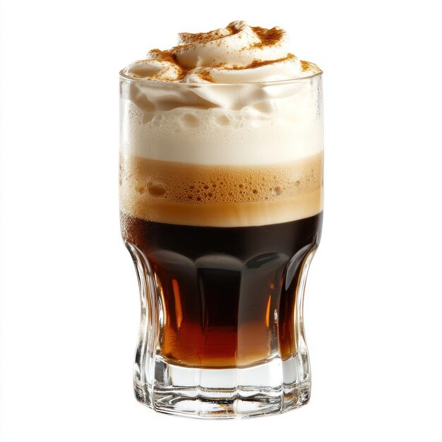 Photo glass of layered coffee beverage with whipped cream and cinnamon