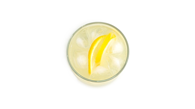 Glass of lemonade with lemon slices and ice. View from the top.