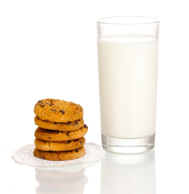 Glass of milk and cookies isolated on white