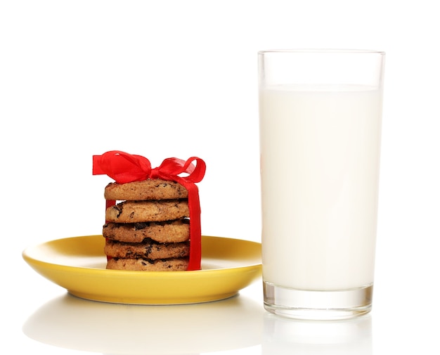 Glass of milk and cookies isolated on white