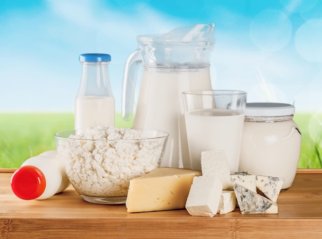 Glass of milk  and Dairy products on  background