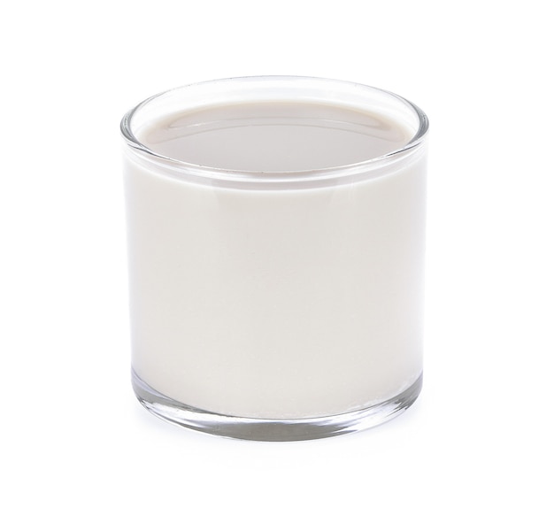 Glass of milk on white background