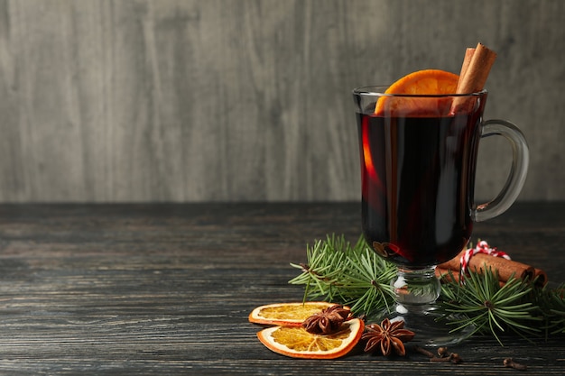 Glass of mulled wine and ingredients