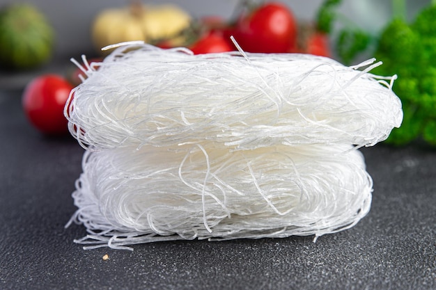 glass noodles raw rice noodles funchose asian food meal snack on the table copy space food