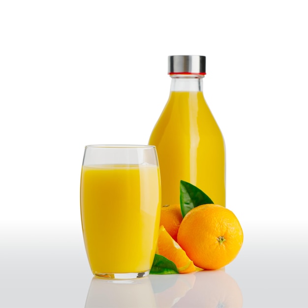 Glass of orange juice and orange juice bottle fresh tropical juice